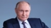 FILE PHOTO: Russian President Putin attends a session of the educational marathon in Moscow